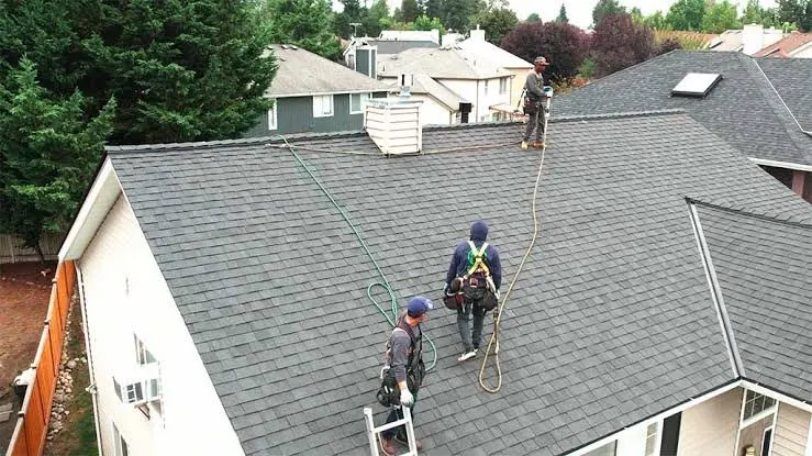 Summit Roofing crew on a residential roof